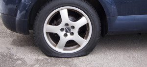 change a flat tire